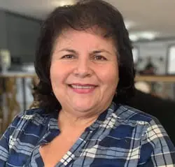 Yolanda Sosa, sonriendo